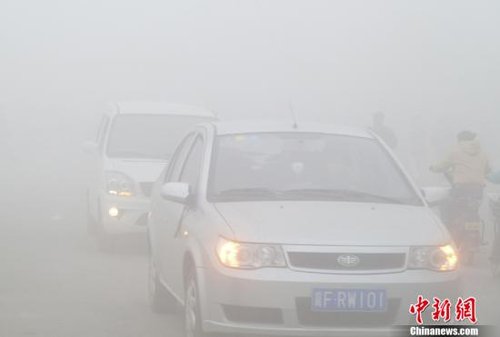 大范围雨雪降温天气席卷中国 东部大雾弥漫(图)
