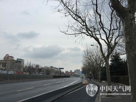 上海“最早入春”遭强降温 明晨最低温接近冰点